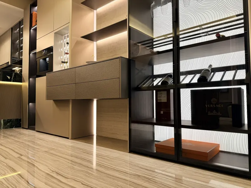 Backlit fluted display wall and textured cabinetry by Modenzo, real photo